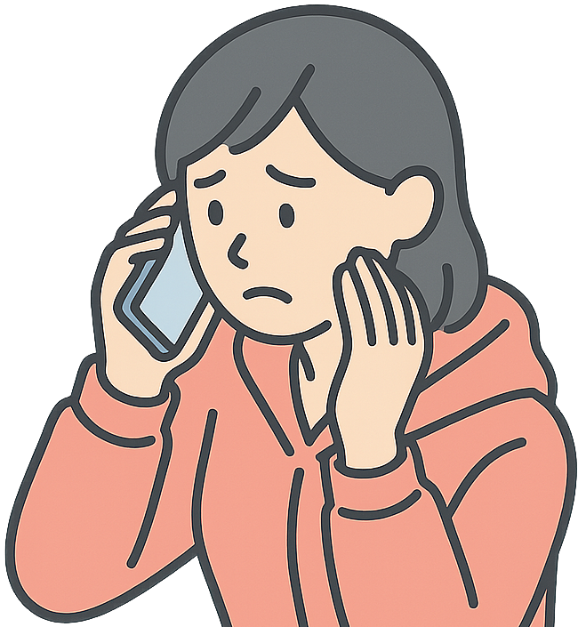 悩みを電話で話している女性