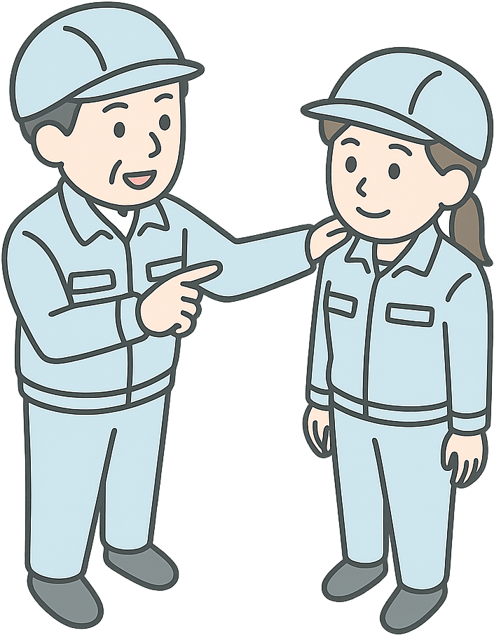先輩の優しい指導を受けている期間工