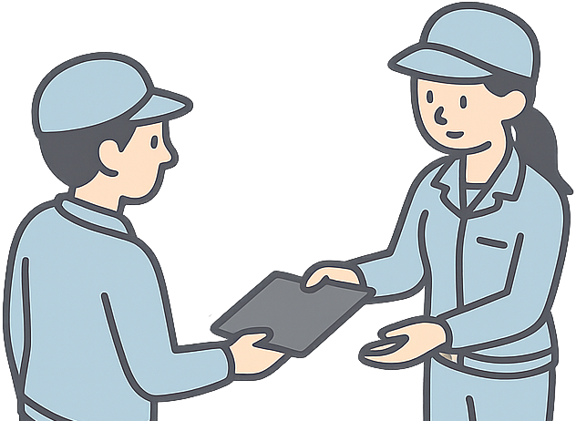 引継業務を行っている工場勤務の人たち